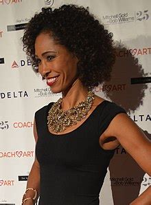 Sage Steele is the pretty lady with Jalen Rose and Doug