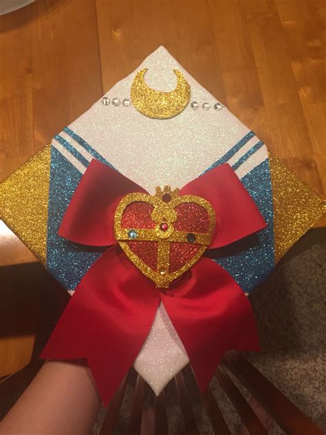 Jun 1, 2021 - Anime inspired graduation cap. Ribbon, glitter construction paper, rhinestones.