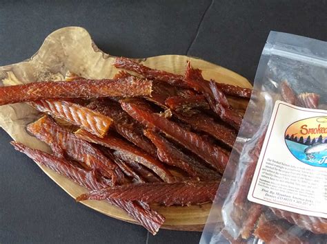 Salmon jerky. About this item . WORRY FREE DOG REWARDS: Our Salmon Jerky strips are made with real, pure, dehydrated salmon meat loaded with nutrient rich Omega 3 & 6 fatty acids and DHA (for puppy brain development); Now you can treat your allergy-prone pal to a 100% hypoallergenic dog treat! 