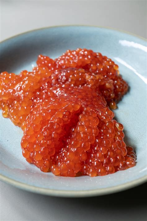 Salmon roe. Salmon roe. Wrongly named red caviar. Salmon roe is orangey, with a bigger size than sturgeon roe and almost as big as a small pea. 