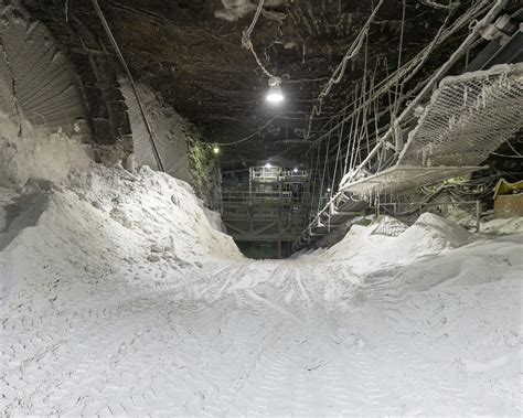 The Cayuga Lake Salt Mine reaches a maximum depth of 2,300 feet, making it the deepest salt mine in North America. It spans more than seven miles underground, tapping into the salt reserves under .... 