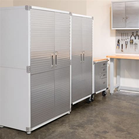 Sam's club garage storage cabinets. This set includes two UltraHD® Mega Storage Cabinets, three UltraHD® Wall Cabinet lockers, two UltraHD® Cabinet Stackers, 48" W x 24" D x 18.5" H, and one UltraHD® Rolling Workbench that features 11 gliding ball-bearing Stainless Steel drawers: 9 small (2.75" H), 1 medium (4.75" H), and 1 large (10.5" H). 