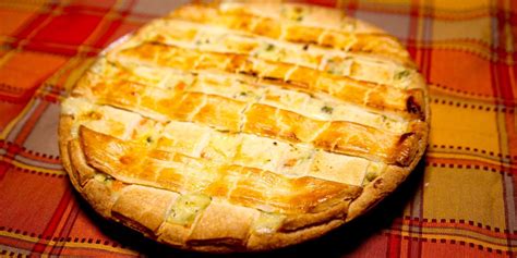 Cook in a toaster oven or conventional oven at 350 degrees to heat the chicken pot pie for about 20 minutes until it s heated through. Use aluminum foil to cover the pie, especially the thin crust on the corners. Cover the chicken pot pie as much as possible. Place it in the oven. Let it sit.. 