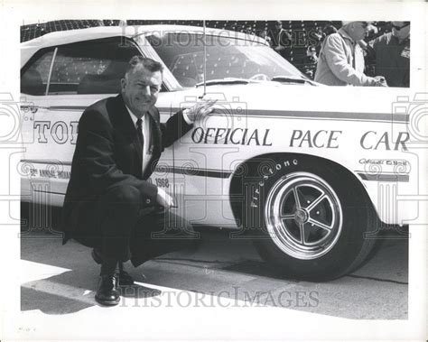 Sam Hanks Displays the Indianapolis News with his Headline, 1957