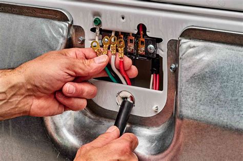Gently place a dryer on a level area where the door can open widely. Use a level and check the levelness of the dryer. The dryer must plug into a properly grounded outlet. Insert the drain hose into the hole (A). Assemble the other side of the drain hose into the drain.. 