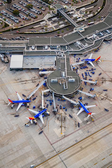San diego airport southwest terminal. As of late afternoon Wednesday, Southwest had canceled 168 flights in San Diego, which amounted to 75 percent of its arriving and departing flights for the day, according to the flight tracking ... 