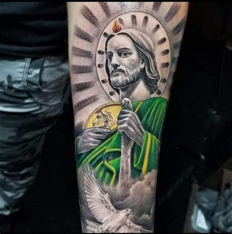  So, let’s dive into these inspiring San Judas Tadeo tattoos and explore the deep-rooted significance behind each design. 1. San Judas with a Burning Candle – Light in Darkness. One of the most common and powerful San Judas Tadeo tattoos features the saint holding a burning candle. . 