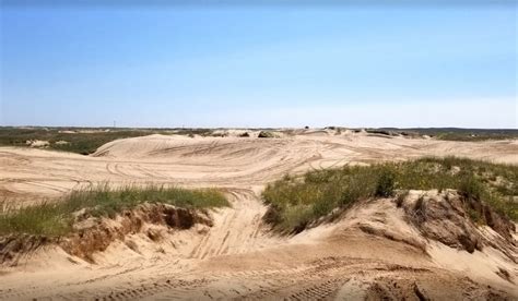 The Badlands Off Road Park is 1400+ acres of multi-directional, diverse terrain. You'll find sand dunes, wooded trails, gravel, mud, and rocks - trails and terrain for all types and skill levels of riders. Bikes and ATVs can test their skills on our full-size MX Track.. 