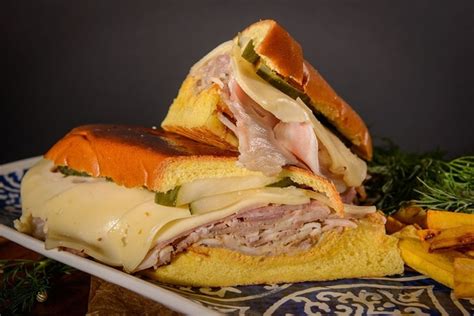 Sanguich de miami. Sandwiches, Cuban. $$. 2057 SW Eighth St. Miami, FL 33135. 305-539-0969. website. Imagine, for a moment, the Cuban sandwich of yesteryear. You could smell pork roasting from blocks away. Then came ... 
