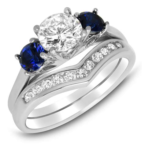 Sapphire wedding ring. Marquise Blue Sapphire Wedding Band White Gold Moissanite Engagement Ring Curved Wedding Band Dainty Ring Bridal Promise Ring for Women. (3.5k) $76.64. $95.80 (20% off) FREE shipping. Wedding set! Man Made White Sapphire engagment ring and matching eternity & Wedding ring in Titanium or White Gold. (18.6k) $159.99. 
