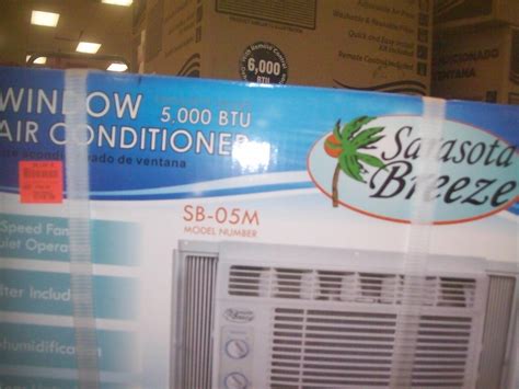 New in the box air conditioner,. 
