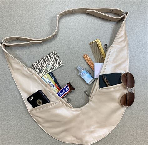Sash bag. Moonstone Leather Sash Bag. $ 169.99. 4 interest-free installments, or from $15.34/mo with. Check your purchasing power. 4.9 out of 5 star rating. 22 Reviews. Add to cart. 
