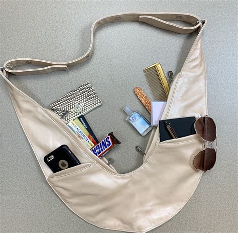 Sashbag - Non-Leather. Choose ShopPay at checkout to break up your purchase in interest-free payments. We promise you will love your bag! If not, you have 30 days to return it in new condition. Our customer service team is pretty famous for taking really good care of our customers. 