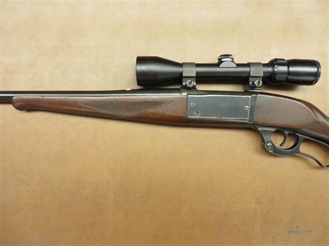 Description: Savage. Model 99T Cal. 303 Savage. 20" barrel. Manufactured 1939. This is the rarest of the 99s and the hardest to come across. Made only for five years between 1935 and 1939, this one being the last year of production. Buckhorn rear sight, Sporting front ramp sight. Has cartridge counter on side, and cocking indicator on top tang.. 