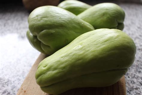 Chayote, also known as sayote or vegetable pear, is a popular vegetable in the Philippines. It belongs to the gourd family, along with melons, cucumbers, and squash. Chayote is a fast-growing climbing vine that produces a pear-shaped fruit with a green or white skin, and a mild, slightly sweet flavor.. 