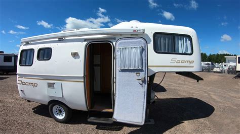 Scamp 19 deluxe. Established in 1972 as a builder of lightweight recreational trailers, Scamp started with a 13-foot travel trailer that sold 130 examples during its first year on the market. Scamp fiberglass trailers emerged at an ideal time where a sector of the recreational vehicle marketplace began to desire a product that would enable fuel efficiency and ... 