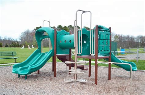 Scarborough recreation.  The playground amenities include two slides, a ...