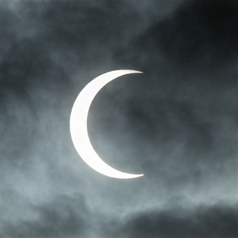 Scene in Edmonds Solar eclipse through the clouds My Edmonds News