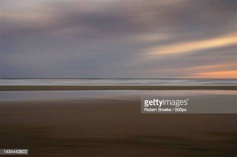 Scenic View Of Sea Against Sky At Sunsetegmond Aan ... - Getty Images