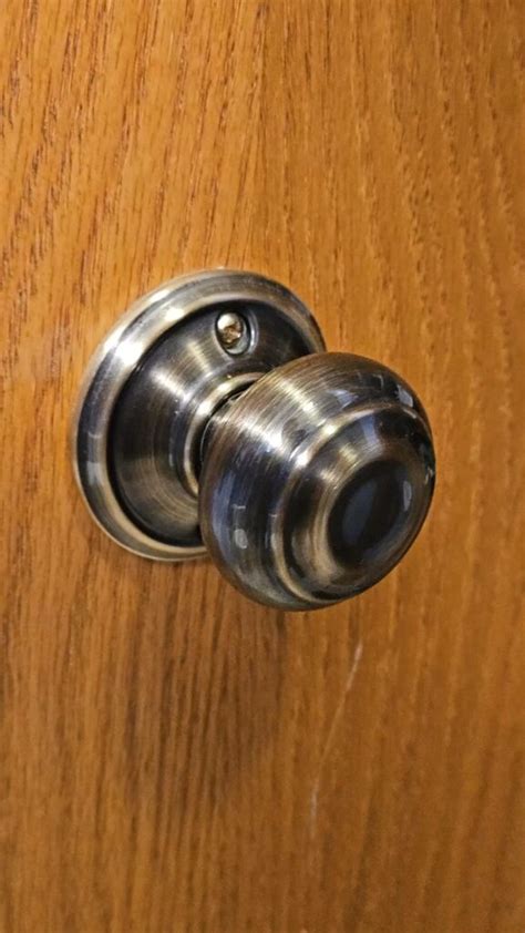 Schlage self locking door knob.  Installation is simple with self-aligning screw hole...