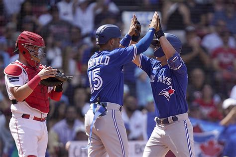 Schneider has 4 hits and 4 RBIs, Chapman drives in 3 as the Blue Jays rout the Red Sox 13-1