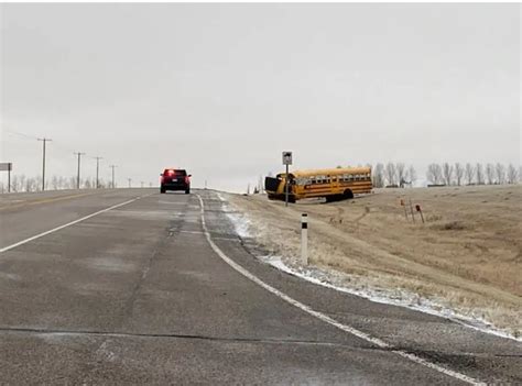 School bus with numerous students rolls over north of Calgary, RCMP say