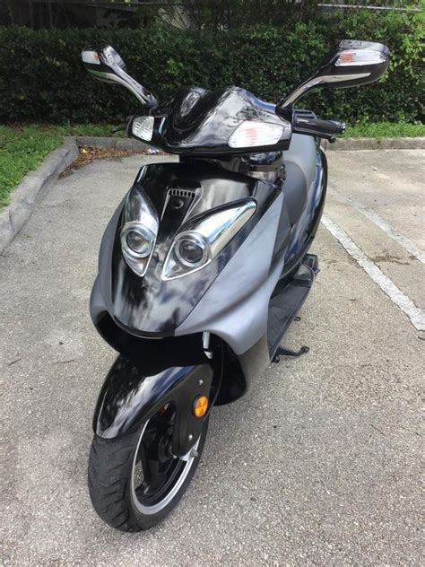 150cc Scooter New •Front and read Hydraulic Brake •Sp
