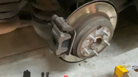 Scraping sound when braking. Any help is greatly appreciated. I just did brakes and rotors all the way around my 2011 equinox awd v6. Afterward i am getting a grinding noise as i brake. The noise is intermittent and when it happens it is always just as i'm almost stopped. It is coming from the front but can't tell which side. 
