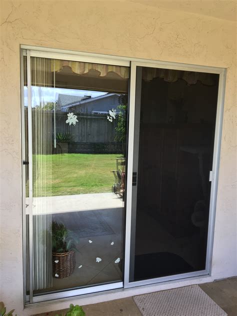 Screen door for slider. A Patiomatic is a durable sliding screen door formed on a roll-mill machine with a one piece frame. Fits most patio doors; Heavy duty frame – .525″ thick; 28 guage, one piece frame construction; Dual hood offers height adjustments for openings 77 5/8″ to 80″ 