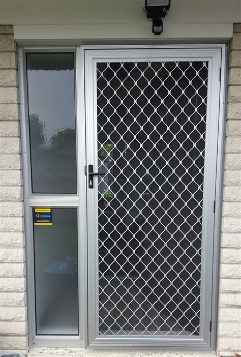 Screen security doors. These aluminum security swinging screen doors are used for security with an insect-tight fit. A heavy-duty aluminum Amplimesh grill is inserted into a powder-coated frame, making for a strong yet resilient door. The Sentry Door is constructed from a 7/8″ x 2-7/8″ .060 extruded aluminum frame, with double strengthened extruded corners. 