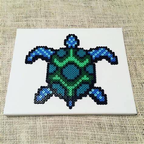 Snappix Sea Turtle. Venture into the depths of the sea to find this cute no-iron design! Perler beads can be used in lo. Tropical Fish Wall Hanging. This fuse bead project will have you thinking of warm tropical days by the ocean. Make your own wate. Coral Reef Water Globe. Create some trendy tile designs with Perler fuse beads and turn them ... . 