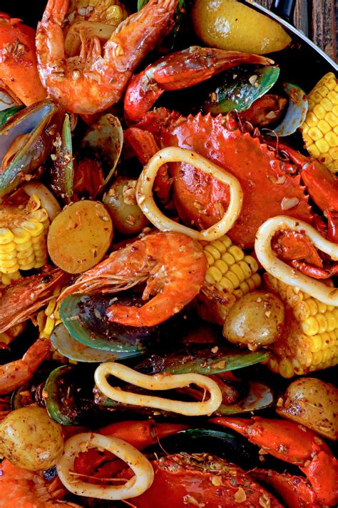 Seafood mix. Bring to a simmer over low to medium heat, and cook for 2 minutes. Adjust salt and pepper to taste. Add the pasta, seafood, and about 1/2 cup of the pasta water that you saved to the sauce. Turn the pasta gently and cook for 1 to 2 minutes, or until the sauce has thickened and covered the pasta. 