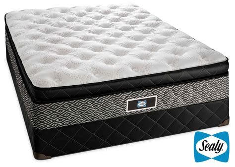 Sealy mattress reviews. The Naturals Hybrid is a 13” hybrid latex bed made by the American bedding company Sealy. Being a hybrid mattress, it features a comfort layer of organic Dunlop latex and a support core of individually pocketed coils. Sealy also markets the Naturals Hybrid as an environmentally friendly bed that is free from toxins and harsh chemicals. 