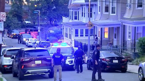 Search continues for person who police say drove at Boston officer, prompting them to shoot