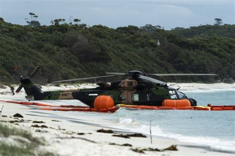 Searchers find black box of Australian army Taipan helicopter that crashed with the loss of 4 lives
