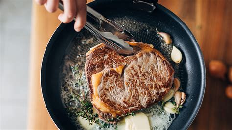 Searing the meat. When it comes to cooking the perfect pan seared steak, there’s more to it than just throwing a piece of meat into a hot pan. Achieving that perfectly seared exterior with a juicy a... 