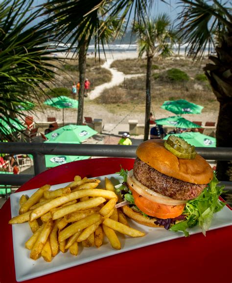 Seaside grill & tiki bar photos. Sliders Seaside Grill Restaurant & Tiki Bar on Fernandina Beach in Amelia Island, Florida is the place for seafood, drinks and live music. 