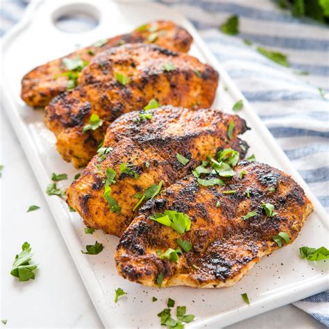 Season chicken for the grill. Boiling chicken before grilling is not required, however, parboiling the meat can make grilling easier. Grilling raw chicken can be more difficult due to the uneven thickness of th... 
