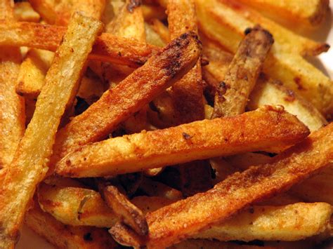 Seasoned fries. Oct 3, 2023 · Directions. Preheat oven to 400°. Cut each potato into 12 wedges. In a large bowl, combine oil, paprika, salt and garlic powder. Add potatoes; toss to coat. Transfer to a greased 15x10x1-in. baking pan. Bake until tender, 40-45 minutes, turning once. 