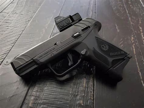 Security 9 red dot. SKU: 115328073. ITEM: 3810. DETAILS & SPECS. REVIEWS. Q&A. Introducing the Ruger Security-9 9mm Luger Semiautomatic Pistol. Featuring a magazine capacity of 15+1 rounds, a Double Action Only (DAO) action, 4-inch barrel, thumb safety, and drift-adjustable sight configuration. Crafted with a black polymer frame and serrated black oxide steel slide. 