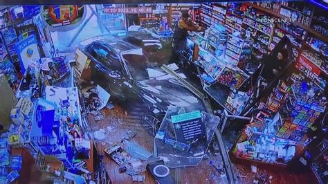 Security footage shows vehicle crash into tobacco store in Brea