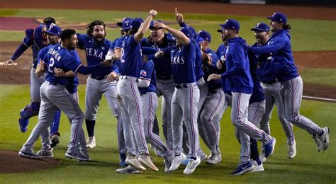 Security prevents Rangers from celebrating in Chase Field pool after winning World Series