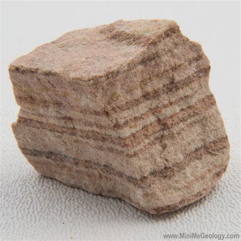 Quartz Sandstone(predominant mineral – quartz) Arkose Sandstone( >25% feldspar/some mica/gen. poor sorting/angular) ‐ can indicate short transport distance and dry climate Graywacke Sandstone(rock frags., qtz, feldspar/poor sorting, >15% matrix)can ind. short trans. distance/poss. submarine dep.
