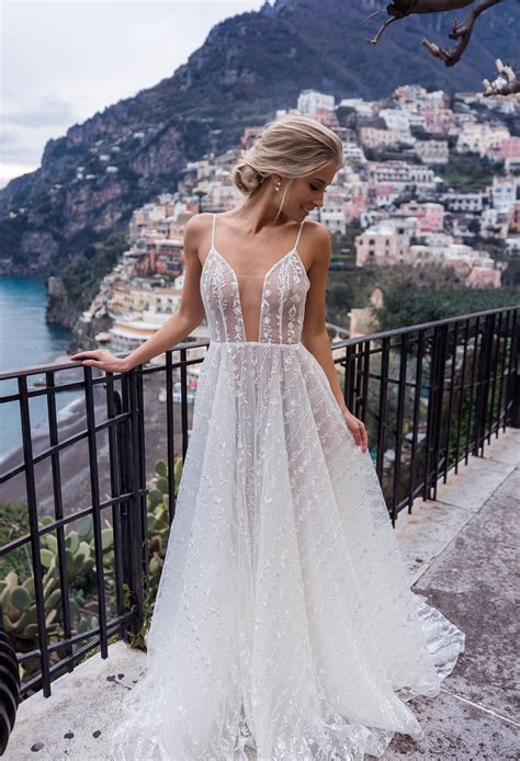 See through wedding dress. Sequins and sparkle wedding dresses are one of the top wedding dress trends. When it comes to sparkle wedding gowns, the sky is the limit for this subtly glamorous trend. Wedding gowns that sparkle are perfect to wear around the holidays, a shimmering sparkle wedding gown would be a dreamy way to tie the knot in the festive season! 