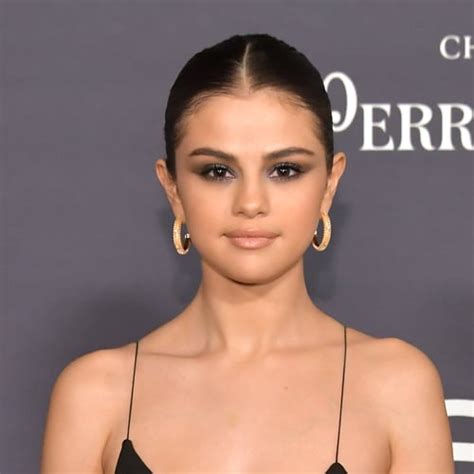 1. Selena Gomez nearly bares it all in a new photo posted by photographer Mert Alas. Covered by only a white blanket and wearing a nude thong, the singer cheekily (pun intended) looks back at the .... Selean gomez nude