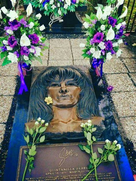 Selena gravestone. Jackie Lizama, of Nacogdoches, Texas, pays her respects at the Selena memorial in Corpus Christi, Texas, on Thursday, March 3, 2005. Selena Quintanilla-Perez, a rising star and popular singer from ... 