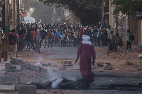 Senegal’s president calls for an investigation into deadly clashes, says he’s open to dialogue