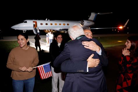 Senior Biden administration official says 5 freed Americans and 2 US family members flying out of Iran in swap