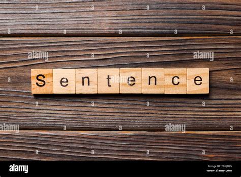 Sentence Word Written on Wood Block. Sentence Text on Table, Concept