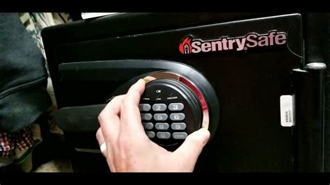 Assuming this is the first time the Sentry Safe is being operated, remove the shipping screw which is on the inside of the door, using the screwdriver. To start, position the handle of the safe UPWARD in the horizontal position. Find the 3-number combination on the back of the Sentry Safe manual. (An example of such a code is 54-25-93.). 
